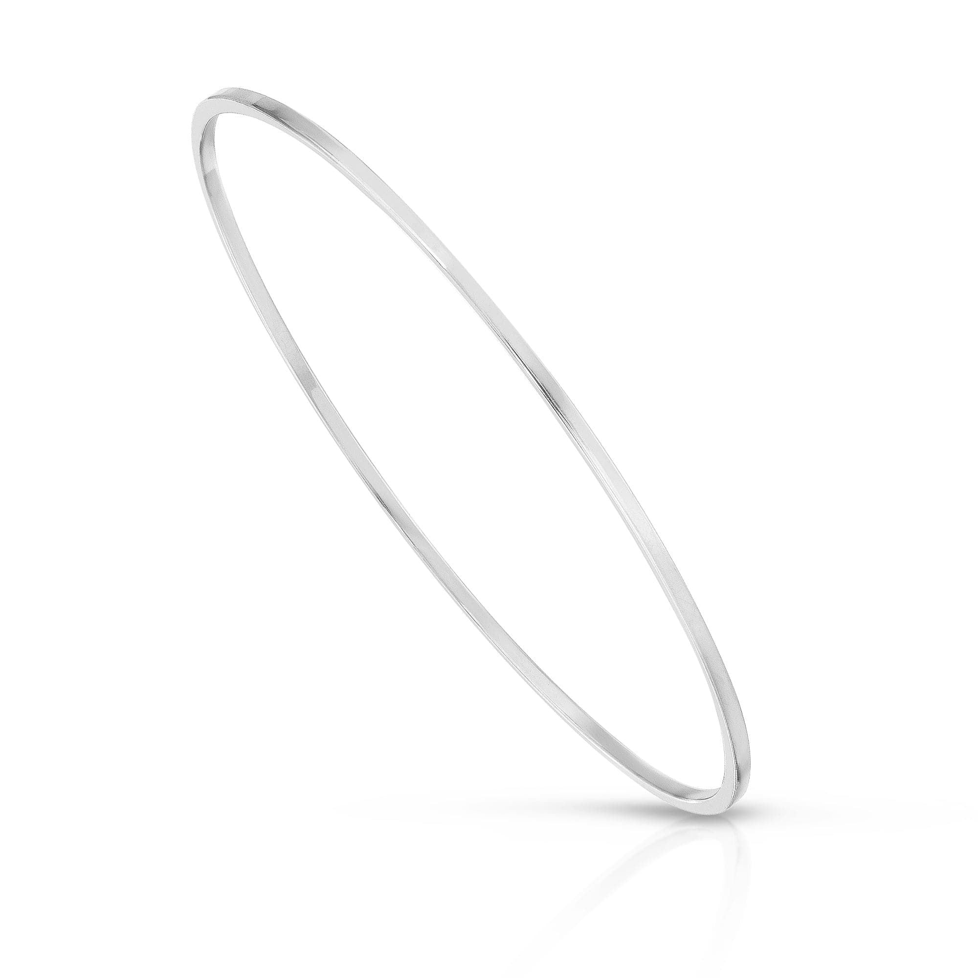 Silver Skinny Stella Bangle bracelet showcasing elegant brass wire design