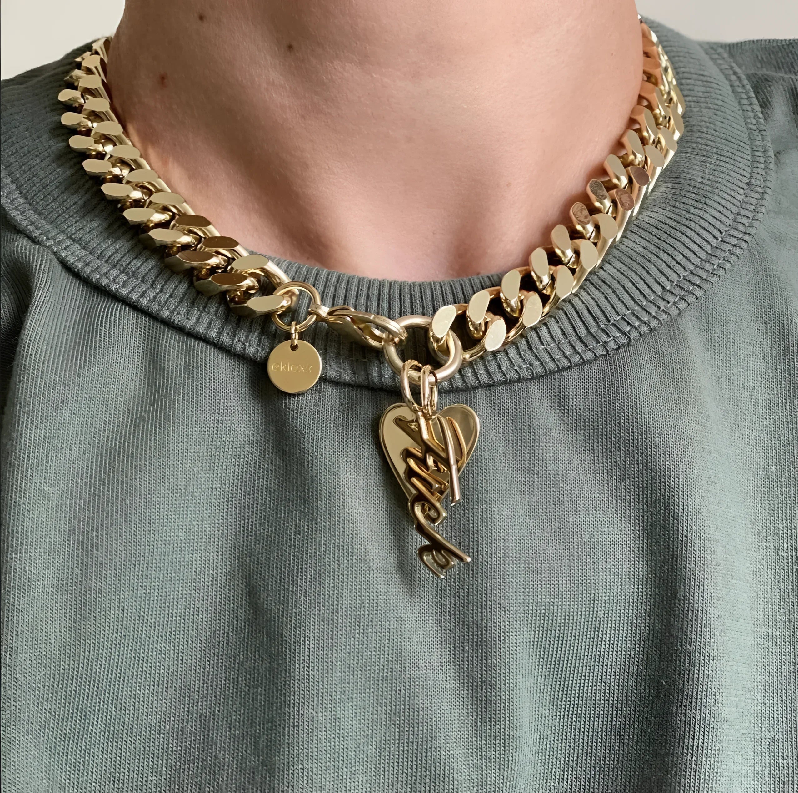 Gold chain necklace with heart pendant from Taraji Necklace with recycled brass and skilled women artisans