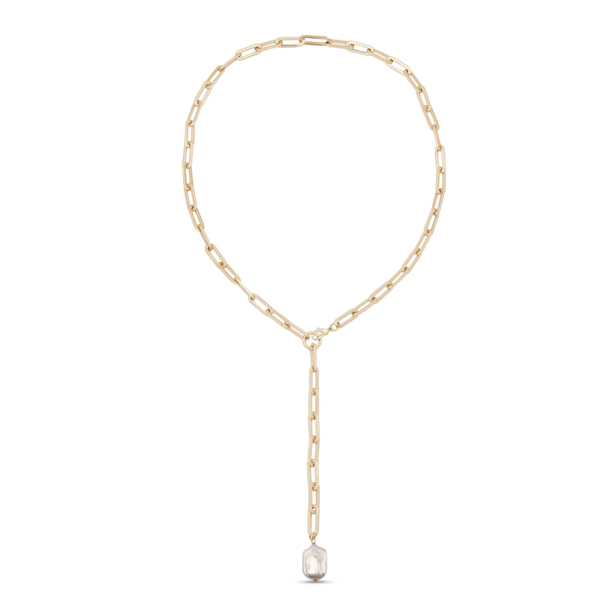 Gold chain Tayla Necklace featuring a clear gemstone pendant for elegant style