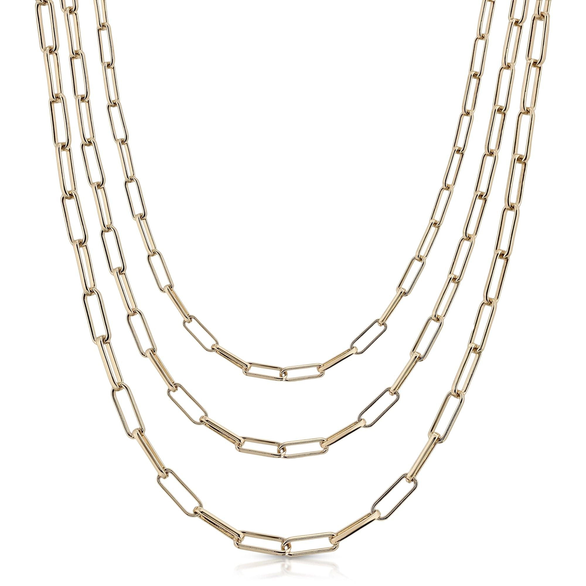 Triple Elongated Link Chain Necklace featuring a three-strand gold chain design