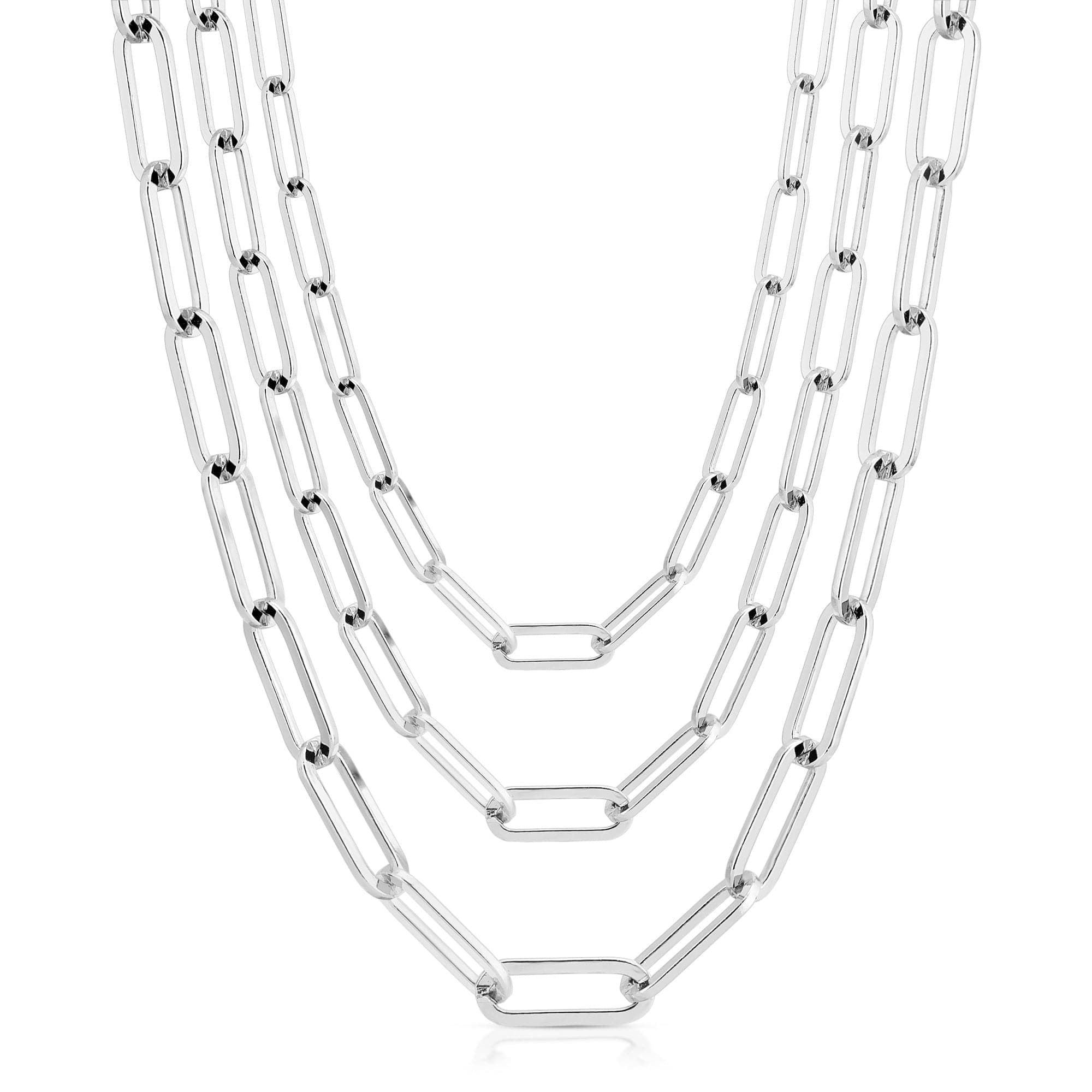 Three-strand silver chain necklace featuring a paper clip chain design for layered looks