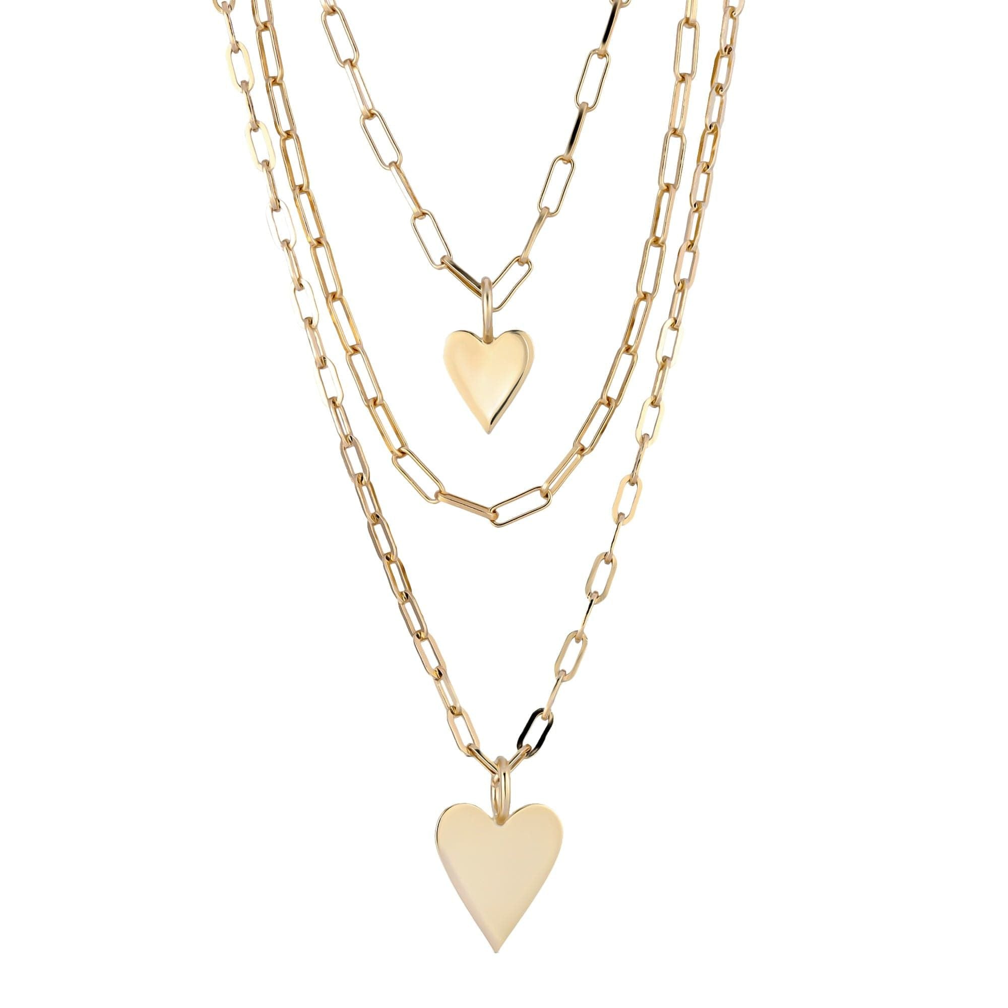 Gold heart pendant layered necklaces featuring elongated link chains and Medium Helena Pendants