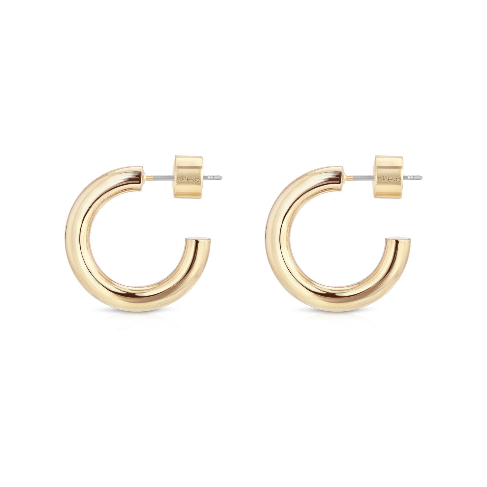 Pair of Zo Huggie Hoops in 14k Gold Rhodium and recycled brass hoops for elegant style