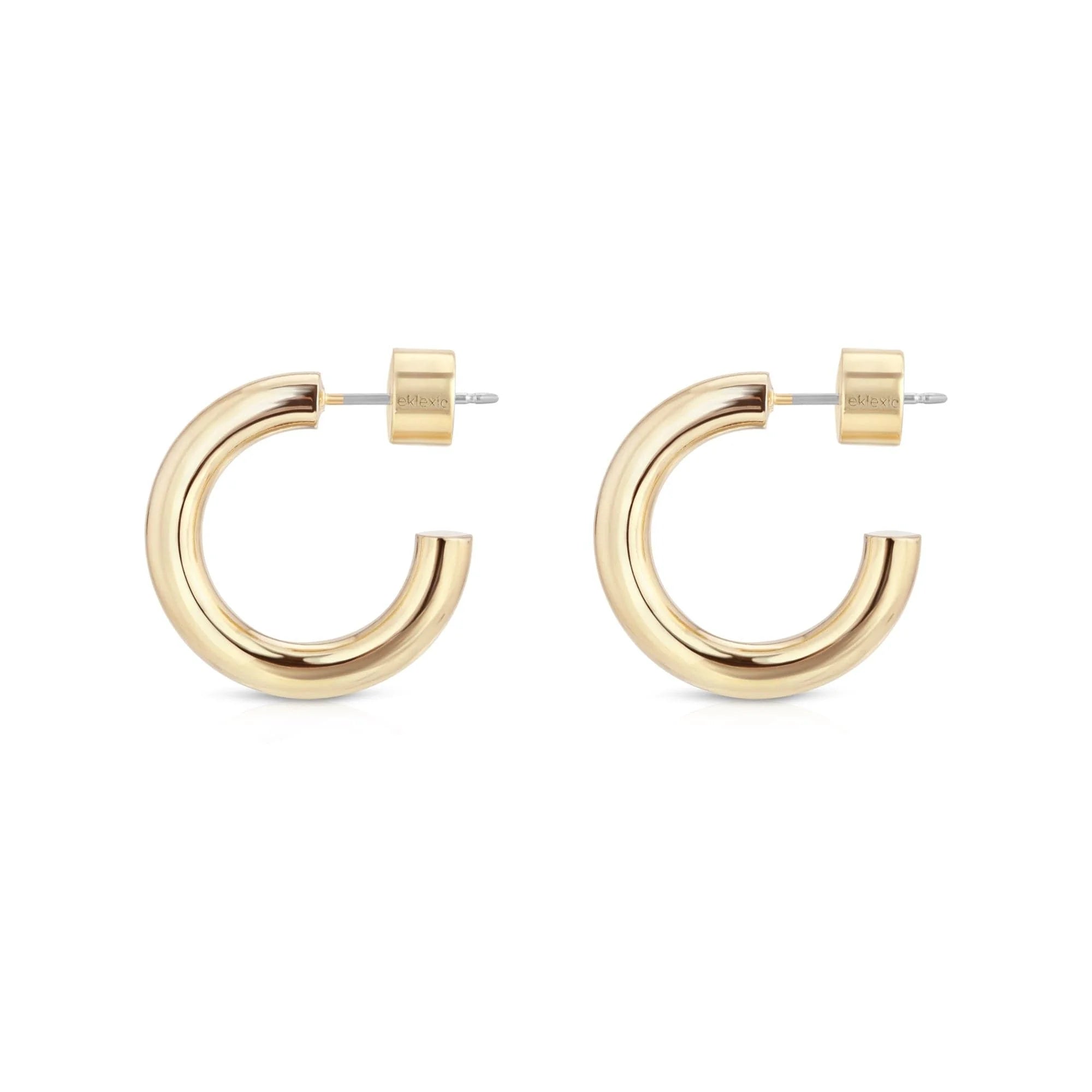 Zo Huggie Hoops featuring recycled brass hoops with 14k gold rhodium finish
