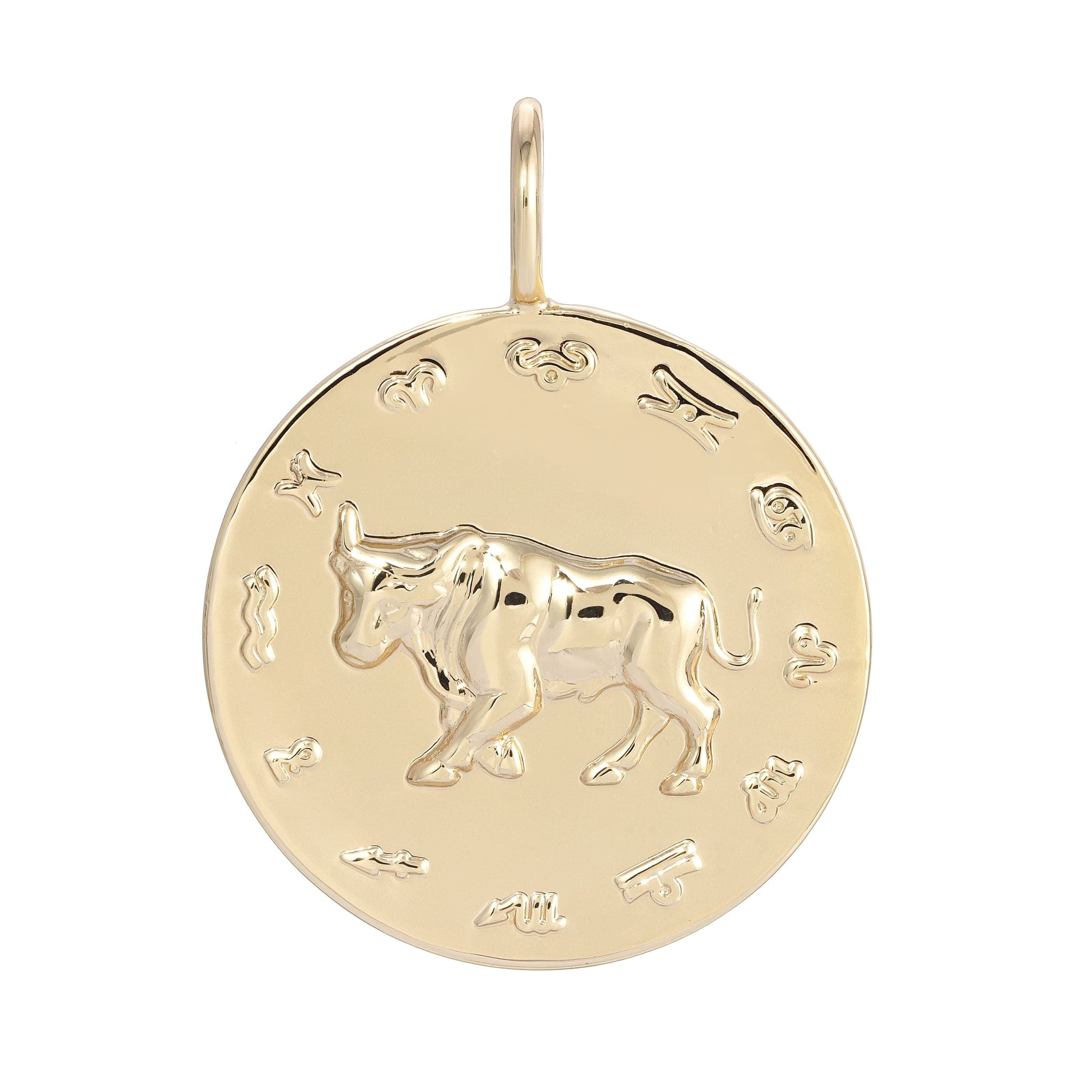 Gold Taurus zodiac pendant, a beautiful earth sign symbolized in elegant jewelry